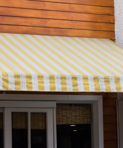 Striped canopy over an entrance